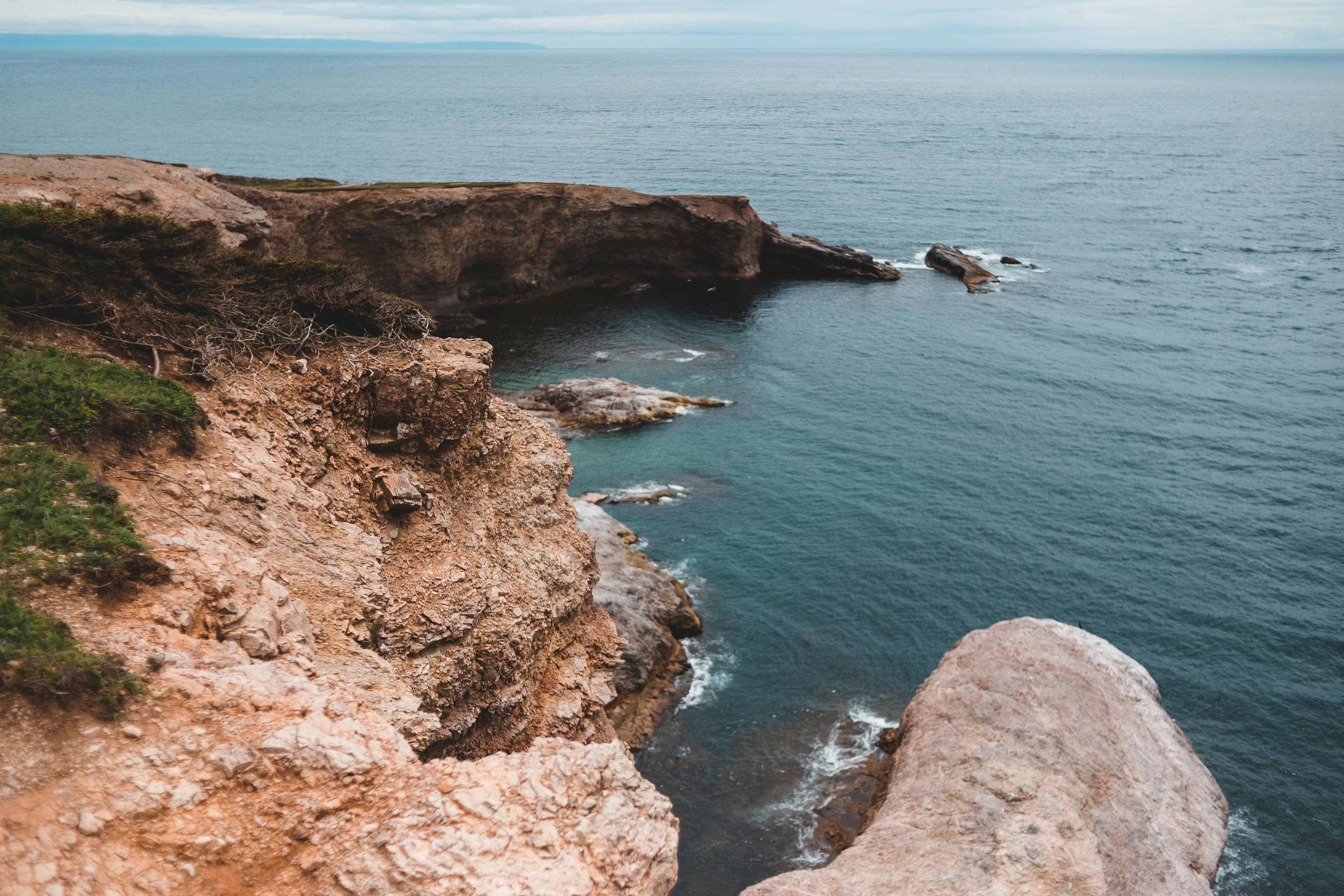 Coastal cliffside on a calm Florida morning, mood imagery for Hair by Beth