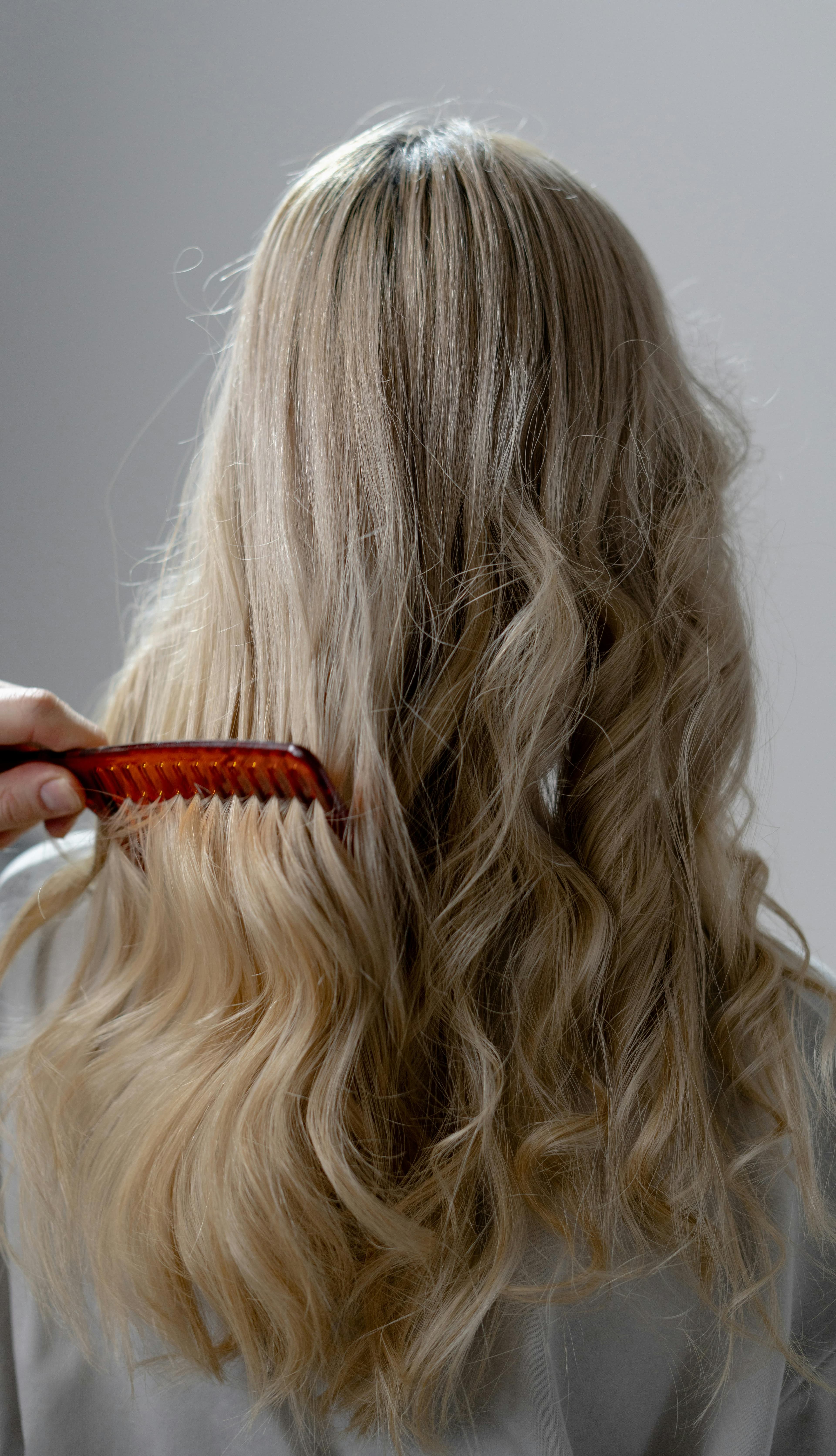 Soft, voluminous waves from a modern perm treatment at Hair by Beth in Riverview FL